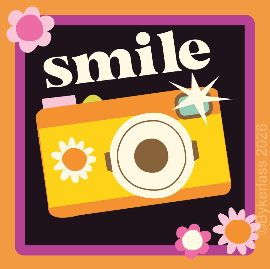 A square graphic design featuring the word 'smile' in large white letters above a retro yellow camera illustration with pink, white, orange, and purple accents, set on an orange background with decorative flowers.