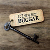 Clever Buggar Rustic Wooden Keyring by Wotmalike