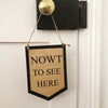 Nowt to see Here Wooden Hanging Banner by Wotmalike