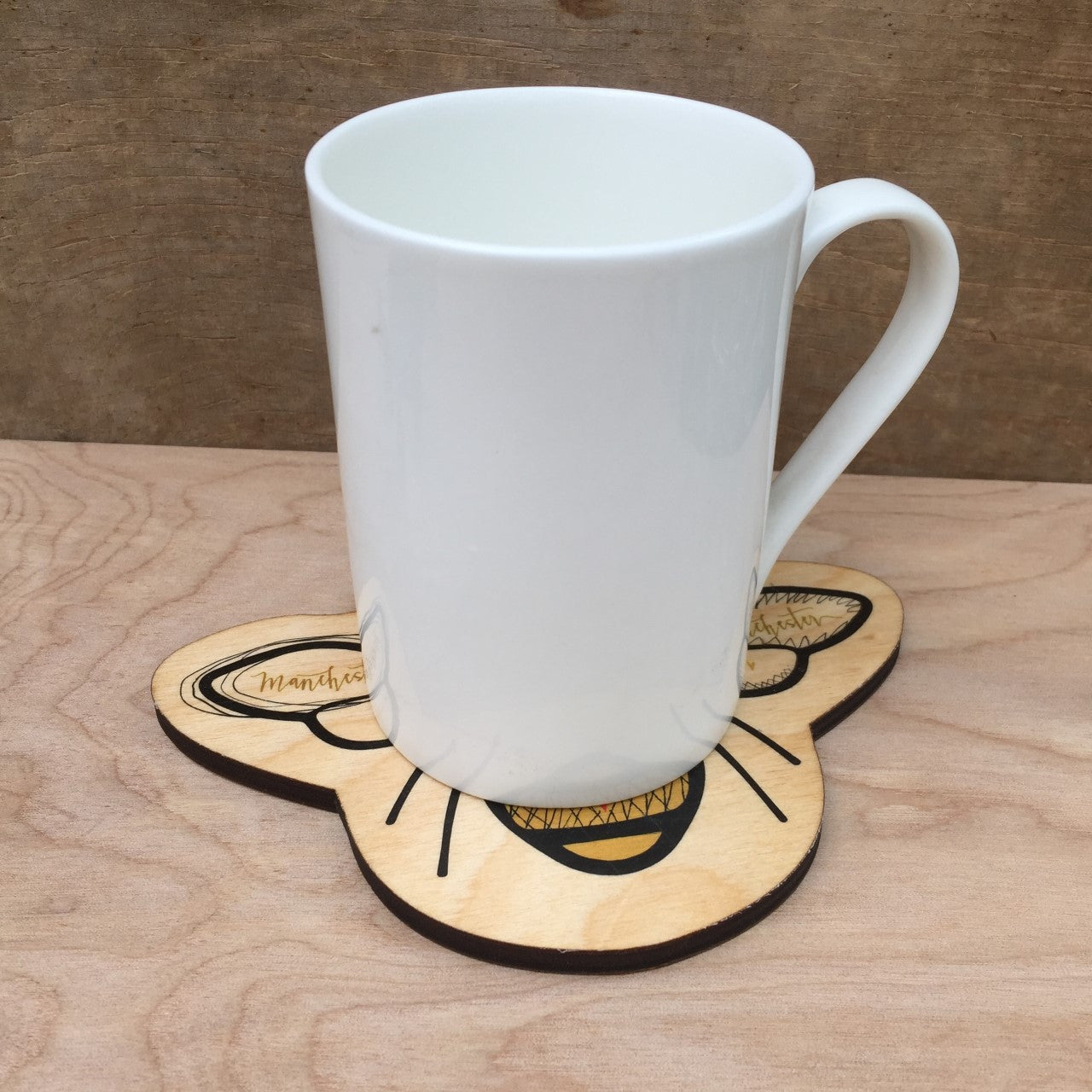 Wooden Manchester Bee Shaped Coaster by Wotmalike